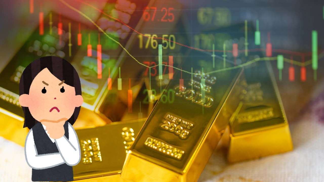 金の延べ棒の写真と金相場を見ながら考え込んでいる女性のイラストです